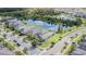 Aerial view of house, neighborhood and pond at 19501 Sea Myrtle Way, Tampa, FL 33647