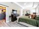 Spacious primary bedroom with large bed, walk-in closet, and ample natural light at 19501 Sea Myrtle Way, Tampa, FL 33647