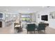 Open-concept living room and kitchen with modern decor at 4303 Pullet Ct, Lakewood Ranch, FL 34211