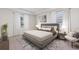 Spacious bedroom with plush carpet and large windows at 4303 Pullet Ct, Lakewood Ranch, FL 34211