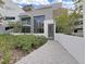 Modern building entrance with landscaped walkway and private courtyard at 3030 W Santiago St # 4, Tampa, FL 33629
