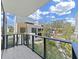 Private balcony overlooking lush landscaping and community at 3030 W Santiago St # 4, Tampa, FL 33629