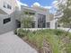 Modern building with landscaped grounds and a private entrance at 3030 W Santiago St # 4, Tampa, FL 33629