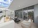 Outdoor patio with seating area and built-in grill at 3030 W Santiago St # 4, Tampa, FL 33629