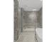 Large bathroom with a walk-in shower and bathtub at 3030 W Santiago St # 4, Tampa, FL 33629