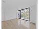 Spacious bedroom with sliding glass doors to balcony at 3030 W Santiago St # 4, Tampa, FL 33629