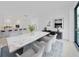 Elegant dining room with marble table and modern chairs at 3030 W Santiago St # 4, Tampa, FL 33629
