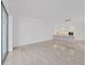 Spacious living area with open kitchen and modern tile floors at 3030 W Santiago St # 4, Tampa, FL 33629