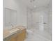 Modern bathroom with a large shower and light wood vanity at 3030 W Santiago St # 4, Tampa, FL 33629