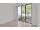 Bright bedroom with large window and view of private garden at 3030 W Santiago St # 4, Tampa, FL 33629