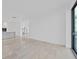 Open living room with kitchen views and sliding glass doors at 3030 W Santiago St # 4, Tampa, FL 33629