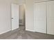 Bright bedroom with double door closet and access to another room at 2110 Purple Orchid Pl, Ruskin, FL 33570