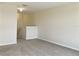 Upstairs loft area with grey carpet and plenty of space at 2110 Purple Orchid Pl, Ruskin, FL 33570