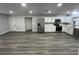 Modern kitchen with stainless steel appliances and white cabinets at 504 Maydell Dr, Tampa, FL 33619