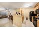 Kitchen features breakfast bar, stainless steel appliances, and light wood cabinets at 5000 Culbreath Key Way # 1-212, Tampa, FL 33611