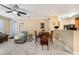 Open concept dining area with seating for four and easy access to the kitchen at 5000 Culbreath Key Way # 1-212, Tampa, FL 33611