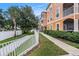 Exterior view of building showing a walkway and well-manicured landscaping at 5000 Culbreath Key Way # 1-212, Tampa, FL 33611