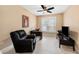 Home office with tile floors, ceiling fan, and plenty of natural light at 5000 Culbreath Key Way # 1-212, Tampa, FL 33611