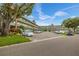 Two-story building with ample parking and landscaping at 2358 Ecuadorian Way # 56, Clearwater, FL 33763