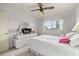 Comfortable bedroom with a king-size bed and patio access at 2358 Ecuadorian Way # 56, Clearwater, FL 33763