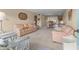 Living room with light beige couches and carpet at 2358 Ecuadorian Way # 56, Clearwater, FL 33763