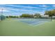 Well-maintained tennis courts in a sunny outdoor setting at 2358 Ecuadorian Way # 56, Clearwater, FL 33763