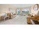 Living room with light beige couches and carpet at 2358 Ecuadorian Way # 56, Clearwater, FL 33763