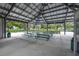 Relaxing outdoor pavilion with picnic tables and grills at 2358 Ecuadorian Way # 56, Clearwater, FL 33763