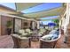 Outdoor patio area with wicker furniture and water features at 4963 Sapphire Sound Dr, Wimauma, FL 33598