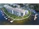 Aerial view of waterfront condo building and marina at 8141 Aquila St # 315, Port Richey, FL 34668