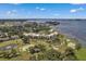 Aerial view of condo community near the waterfront and golf course at 50 Coe Rd # 224, Belleair, FL 33756