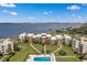 Condo building with waterfront view and community pool at 50 Coe Rd # 224, Belleair, FL 33756