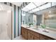 Updated bathroom with a walk-in shower and stylish vanity at 50 Coe Rd # 224, Belleair, FL 33756