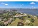 Aerial view of waterfront condo community with golf course views at 50 Coe Rd # 224, Belleair, FL 33756