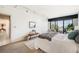 Bright bedroom with water view and access to a living area at 50 Coe Rd # 224, Belleair, FL 33756
