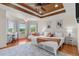 Main bedroom with a king bed and gorgeous water views at 11302 Southwind Lake Dr, Gibsonton, FL 33534