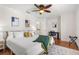 Main bedroom with hardwood floors and a home office area at 11302 Southwind Lake Dr, Gibsonton, FL 33534