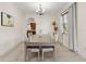 Bright dining room with a large table and six chairs at 11302 Southwind Lake Dr, Gibsonton, FL 33534