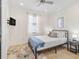 Bright bedroom with a comfortable bed and modern decor at 11302 Southwind Lake Dr, Gibsonton, FL 33534