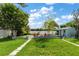 Spacious backyard with firepit, shed, and water views at 11302 Southwind Lake Dr, Gibsonton, FL 33534