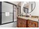 Clean bathroom with granite countertop and walk-in shower at 11302 Southwind Lake Dr, Gibsonton, FL 33534