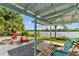 Relaxing covered patio overlooking the lake at 11302 Southwind Lake Dr, Gibsonton, FL 33534