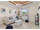 Cozy living room with a comfortable sofa and neutral color palette at 11302 Southwind Lake Dr, Gibsonton, FL 33534
