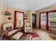 Bright and welcoming entryway with comfortable seating at 35027 Wagner Way, Zephyrhills, FL 33541