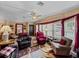 Comfortable living room with ample seating and natural light at 35027 Wagner Way, Zephyrhills, FL 33541