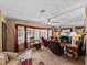 Open living area with multiple seating options and large windows at 35027 Wagner Way, Zephyrhills, FL 33541