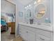 Double vanity bathroom with view into bedroom at 35027 Wagner Way, Zephyrhills, FL 33541