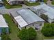 Aerial view of the property showing the house and surrounding landscape at 35027 Wagner Way, Zephyrhills, FL 33541