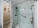 Updated bathroom with a large walk-in shower, tile surround, and modern fixtures at 35027 Wagner Way, Zephyrhills, FL 33541