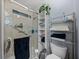 Clean bathroom with shower and storage at 35027 Wagner Way, Zephyrhills, FL 33541